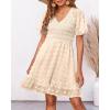 imageBTFBM Womens V Neck Casual Vacation Dress Short Sleeve Smocked Swiss Dot Swing Ruffle Mini Beach Summer Dresses 2025Swiss Dot Apricot
