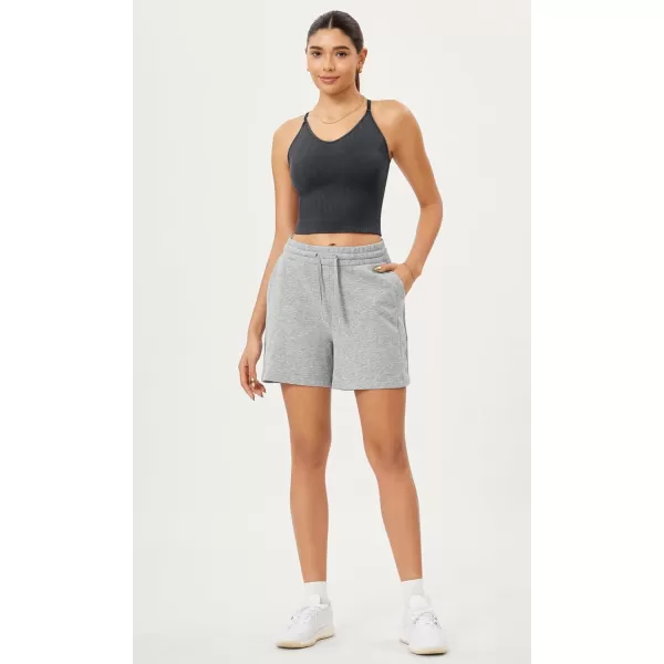 ODODOS Seamless Padded Sports Bra for Women CrissCross Back Longline Wirefree Brami Ribbed Crop Tank TopsBlack