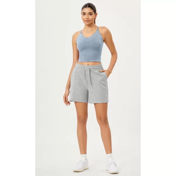 ODODOS Seamless Padded Sports Bra for Women CrissCross Back Longline Wirefree Brami Ribbed Crop Tank TopsCoastline