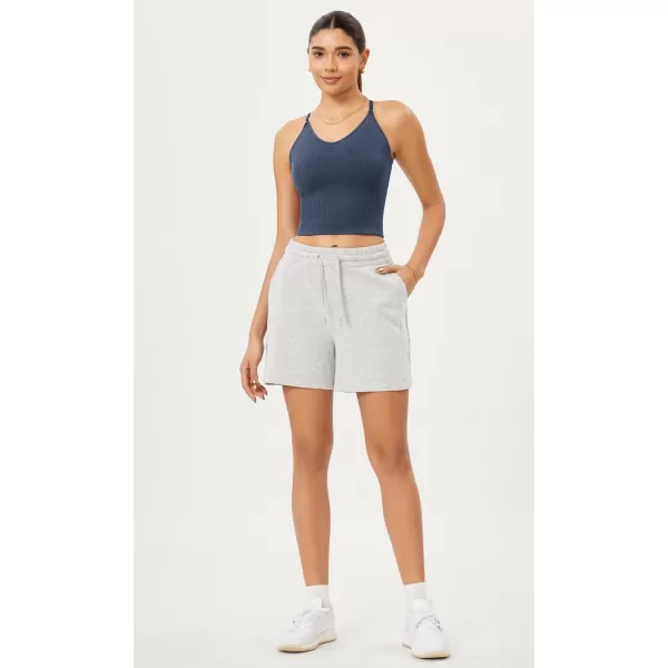 ODODOS Seamless Padded Sports Bra for Women CrissCross Back Longline Wirefree Brami Ribbed Crop Tank TopsDenim Blue