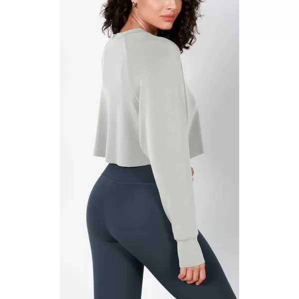 imageODODOS Modal Soft Long Sleeve Cropped Sweatshirts with Thumb Hole for Women Crew Neck Pullover Crop TopFrosted Mint