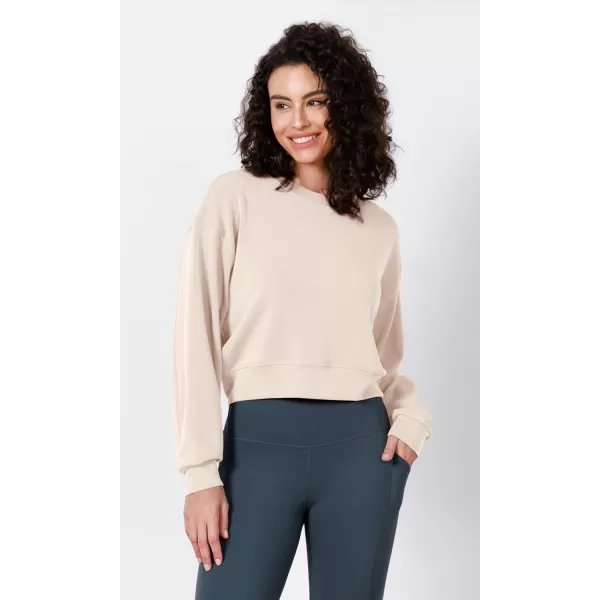 imageODODOS Modal Soft Long Sleeve Cropped Sweatshirts for Women Oversized Crew Neck Pullover Crop TopBeige