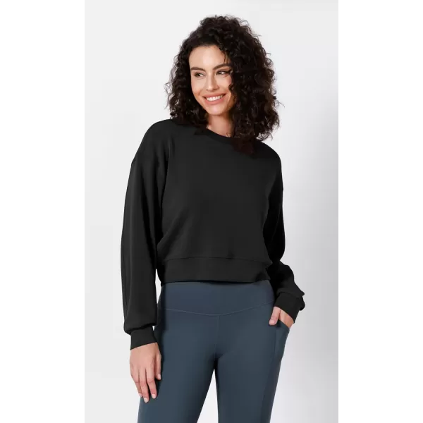 imageODODOS Modal Soft Long Sleeve Cropped Sweatshirts for Women Oversized Crew Neck Pullover Crop TopBlack