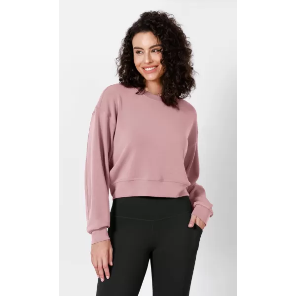 imageODODOS Modal Soft Long Sleeve Cropped Sweatshirts for Women Oversized Crew Neck Pullover Crop TopLight Pink