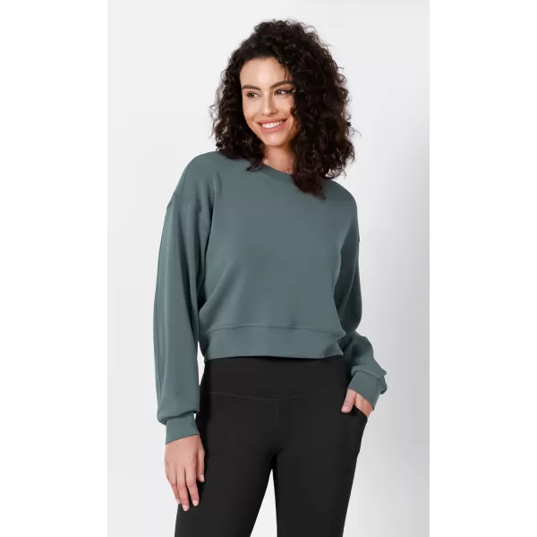 imageODODOS Modal Soft Long Sleeve Cropped Sweatshirts for Women Oversized Crew Neck Pullover Crop TopSlate Green