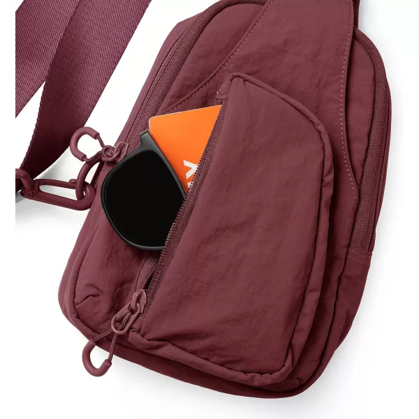 imageODODOS Daily Sling Bag with Adjustable Straps Crossbody Chest Bag Lightweight Small Backpack for Casual Traveling HikingWine