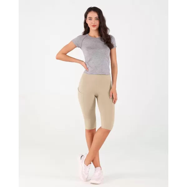 imageODODOS Womens High Waisted Yoga Capris with Pockets Tummy Control Non See Through Workout Athletic Running Capri LeggingsBeige