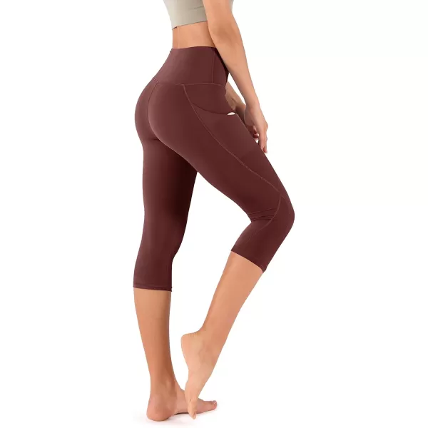 imageODODOS Womens High Waisted Yoga Capris with Pockets Tummy Control Non See Through Workout Athletic Running Capri LeggingsBurgundy