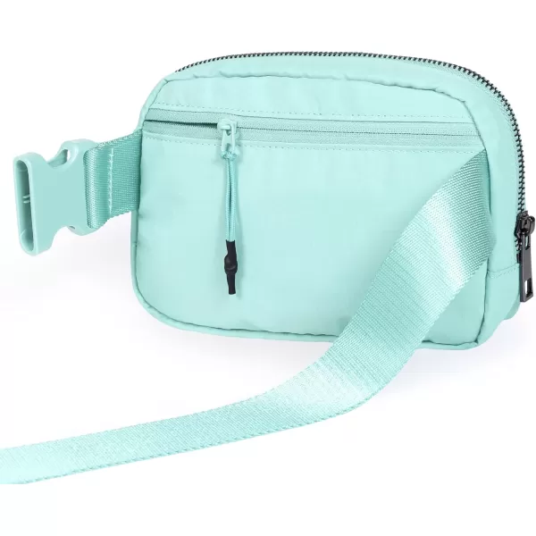 imageODODOS Unisex Mini Belt Bag with Adjustable Strap Small Fanny Pack for Workout Running Traveling Hiking IvoryIcing Blue