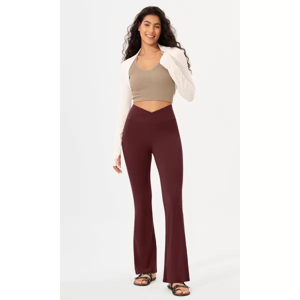 imageODODOS Womens Cross Waist Bootcut Yoga Pants with Inner Pocket Non See Through Bootleg Gym Workout PantsBurgundy