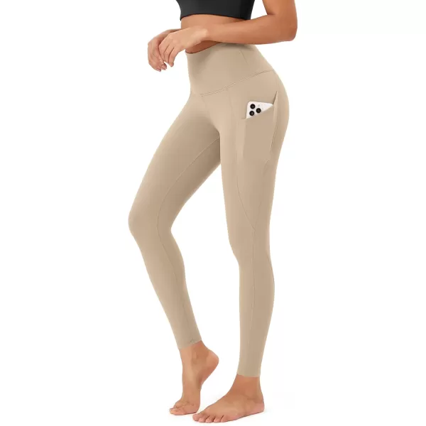 imageODODOS Womens High Waisted Yoga Leggings with Pockets Tummy Control Non See Through Workout Athletic Running Yoga PantsBeige