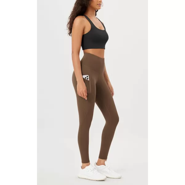 imageODODOS Womens High Waisted Yoga Leggings with Pockets Tummy Control Non See Through Workout Athletic Running Yoga PantsBrunette