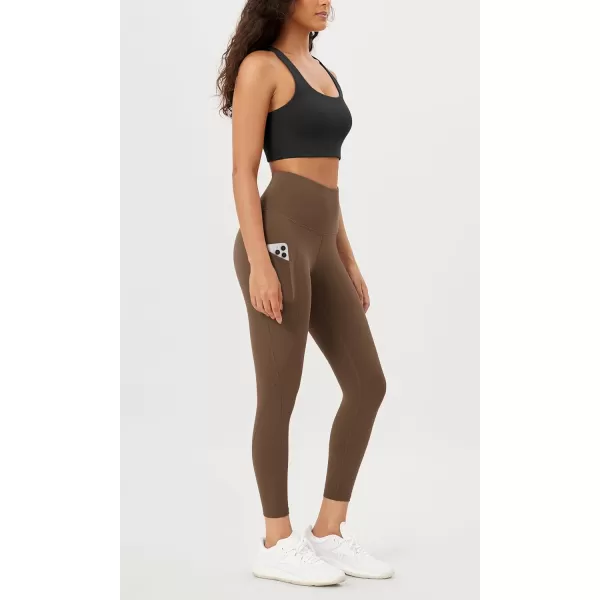 imageODODOS Womens High Waisted Yoga Leggings with Pockets Tummy Control Non See Through Workout Athletic Running Yoga PantsBrunette