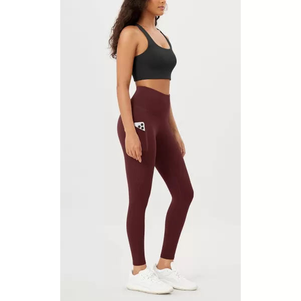 imageODODOS Womens High Waisted Yoga Leggings with Pockets Tummy Control Non See Through Workout Athletic Running Yoga PantsBurgundy