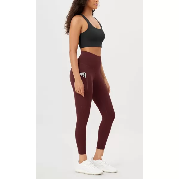 imageODODOS Womens High Waisted Yoga Leggings with Pockets Tummy Control Non See Through Workout Athletic Running Yoga PantsBurgundy