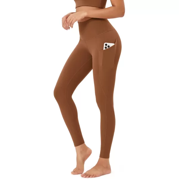 imageODODOS Womens High Waisted Yoga Leggings with Pockets Tummy Control Non See Through Workout Athletic Running Yoga PantsCaramel