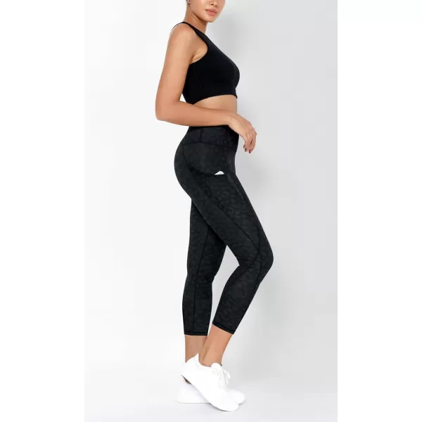 imageODODOS Womens High Waisted Yoga Leggings with Pockets Tummy Control Non See Through Workout Athletic Running Yoga PantsCharcoal Leopard