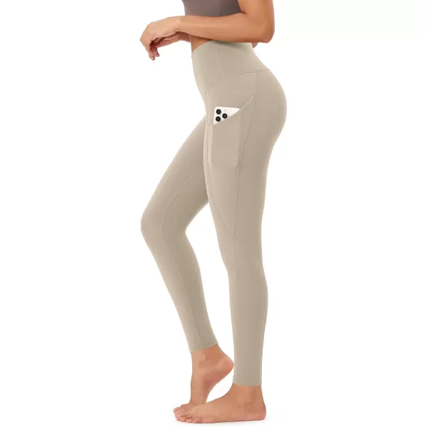 imageODODOS Womens High Waisted Yoga Leggings with Pockets Tummy Control Non See Through Workout Athletic Running Yoga PantsDark Beige