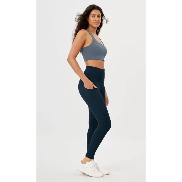 imageODODOS Womens High Waisted Yoga Leggings with Pockets Tummy Control Non See Through Workout Athletic Running Yoga PantsDeep Navy