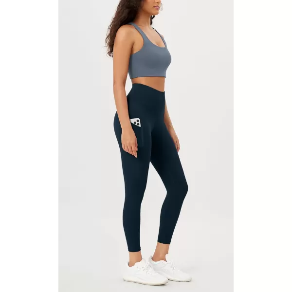 imageODODOS Womens High Waisted Yoga Leggings with Pockets Tummy Control Non See Through Workout Athletic Running Yoga PantsDeep Navy