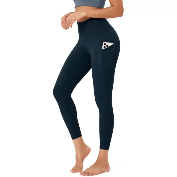imageODODOS Womens High Waisted Yoga Leggings with Pockets Tummy Control Non See Through Workout Athletic Running Yoga PantsDeep Navy