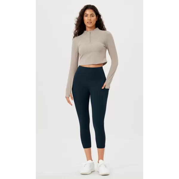 imageODODOS Womens High Waisted Yoga Leggings with Pockets Tummy Control Non See Through Workout Athletic Running Yoga PantsDeep Navy