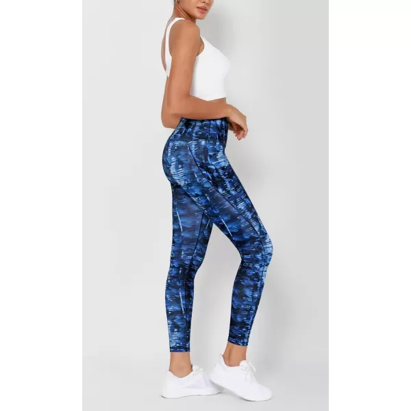 imageODODOS Womens High Waisted Yoga Leggings with Pockets Tummy Control Non See Through Workout Athletic Running Yoga PantsIndigo