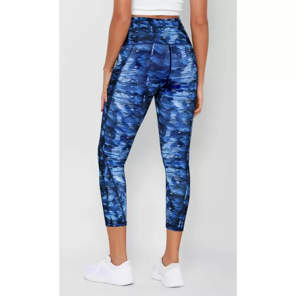 imageODODOS Womens High Waisted Yoga Leggings with Pockets Tummy Control Non See Through Workout Athletic Running Yoga PantsIndigo