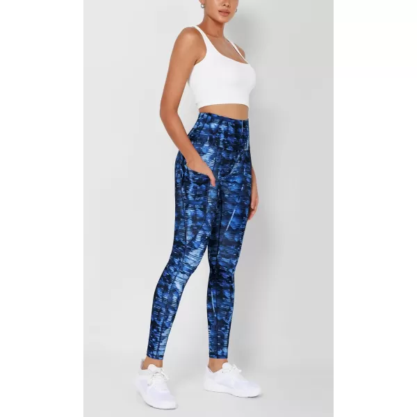 imageODODOS Womens High Waisted Yoga Leggings with Pockets Tummy Control Non See Through Workout Athletic Running Yoga PantsIndigo