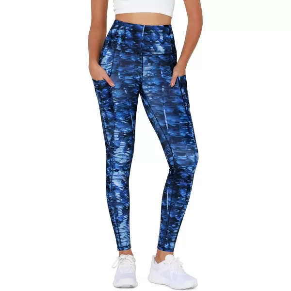 imageODODOS Womens High Waisted Yoga Leggings with Pockets Tummy Control Non See Through Workout Athletic Running Yoga PantsIndigo