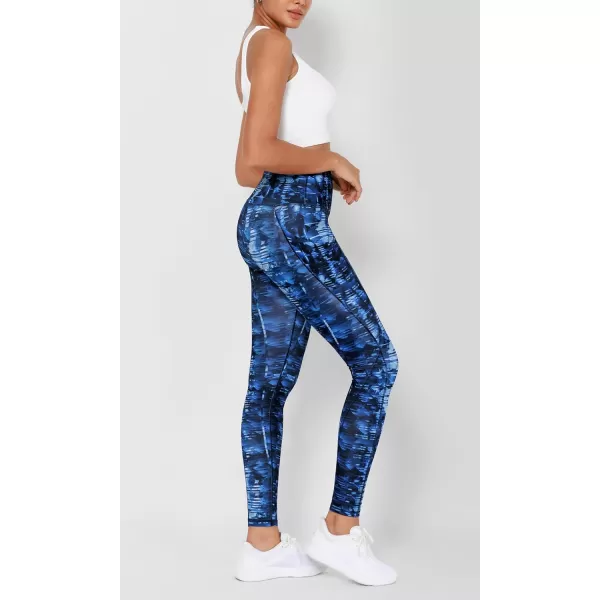 imageODODOS Womens High Waisted Yoga Leggings with Pockets Tummy Control Non See Through Workout Athletic Running Yoga PantsIndigo