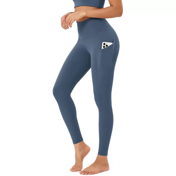 imageODODOS Womens High Waisted Yoga Leggings with Pockets Tummy Control Non See Through Workout Athletic Running Yoga PantsInk Blue
