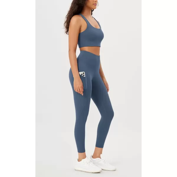 imageODODOS Womens High Waisted Yoga Leggings with Pockets Tummy Control Non See Through Workout Athletic Running Yoga PantsInk Blue