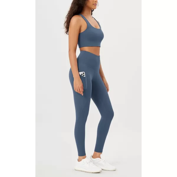 imageODODOS Womens High Waisted Yoga Leggings with Pockets Tummy Control Non See Through Workout Athletic Running Yoga PantsInk Blue