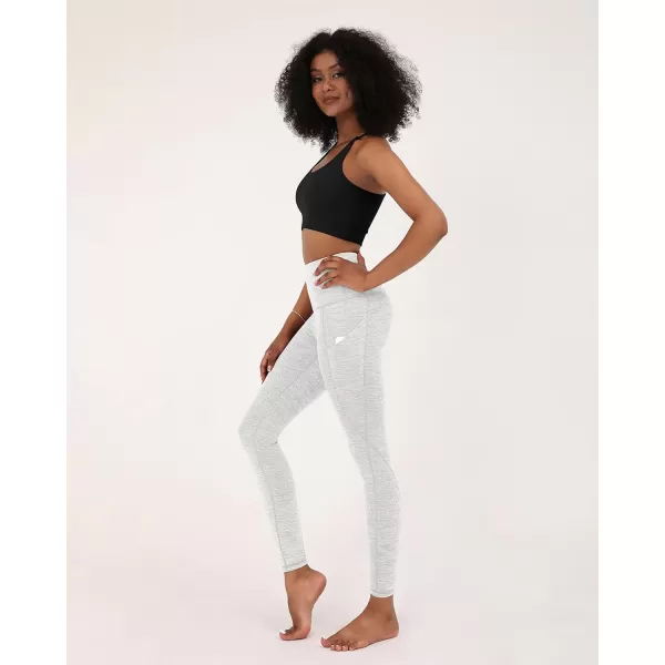 imageODODOS Womens High Waisted Yoga Leggings with Pockets Tummy Control Non See Through Workout Athletic Running Yoga PantsJacquard White