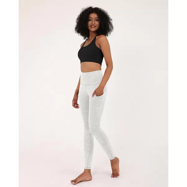 imageODODOS Womens High Waisted Yoga Leggings with Pockets Tummy Control Non See Through Workout Athletic Running Yoga PantsJacquard White