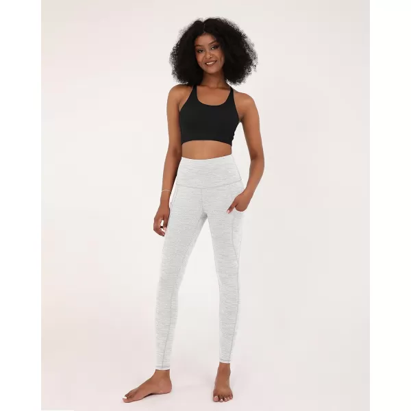 imageODODOS Womens High Waisted Yoga Leggings with Pockets Tummy Control Non See Through Workout Athletic Running Yoga PantsJacquard White