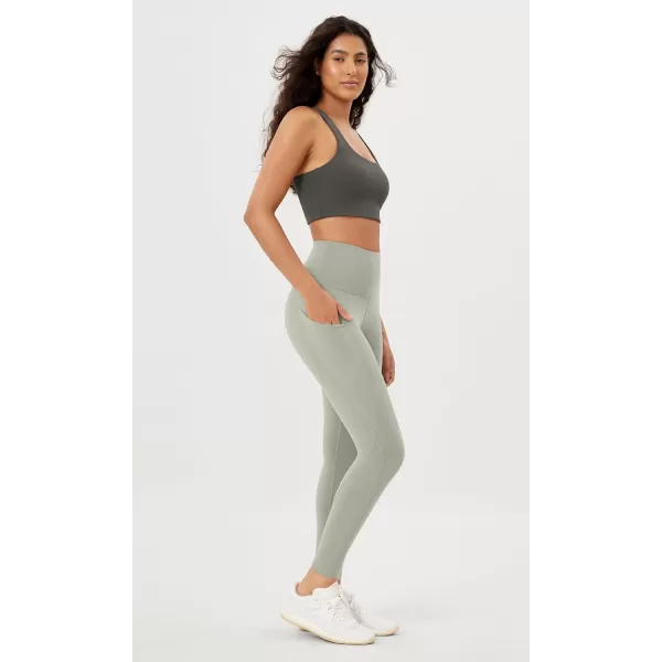 imageODODOS Womens High Waisted Yoga Leggings with Pockets Tummy Control Non See Through Workout Athletic Running Yoga PantsLime Stone