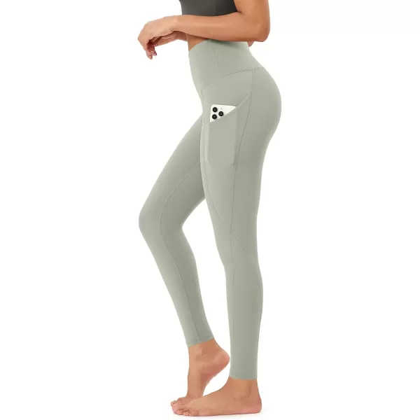 imageODODOS Womens High Waisted Yoga Leggings with Pockets Tummy Control Non See Through Workout Athletic Running Yoga PantsLime Stone