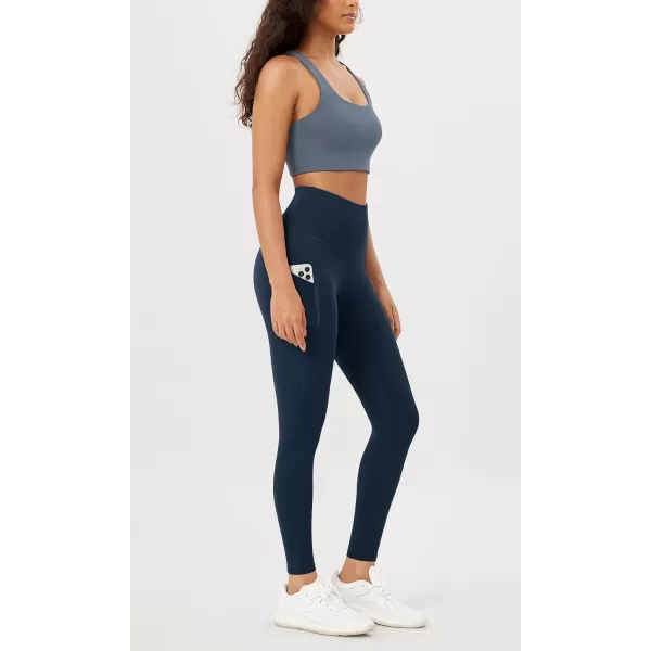 imageODODOS Womens High Waisted Yoga Leggings with Pockets Tummy Control Non See Through Workout Athletic Running Yoga PantsNavy