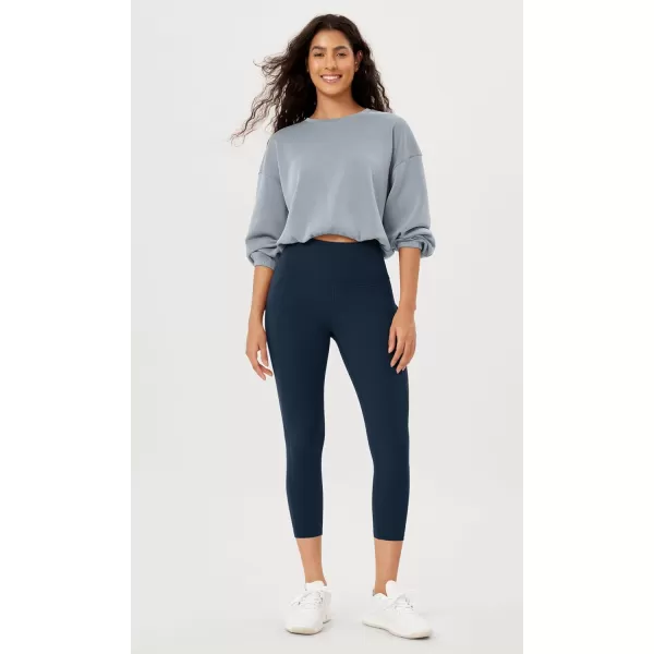 imageODODOS Womens High Waisted Yoga Leggings with Pockets Tummy Control Non See Through Workout Athletic Running Yoga PantsNavy