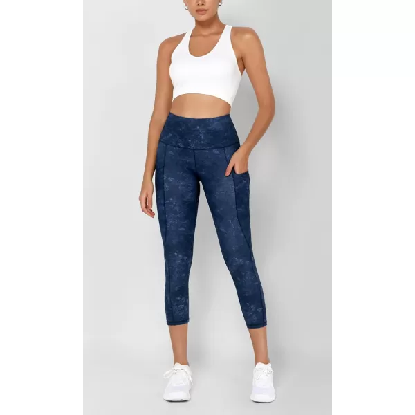 imageODODOS Womens High Waisted Yoga Leggings with Pockets Tummy Control Non See Through Workout Athletic Running Yoga PantsNavy Stone