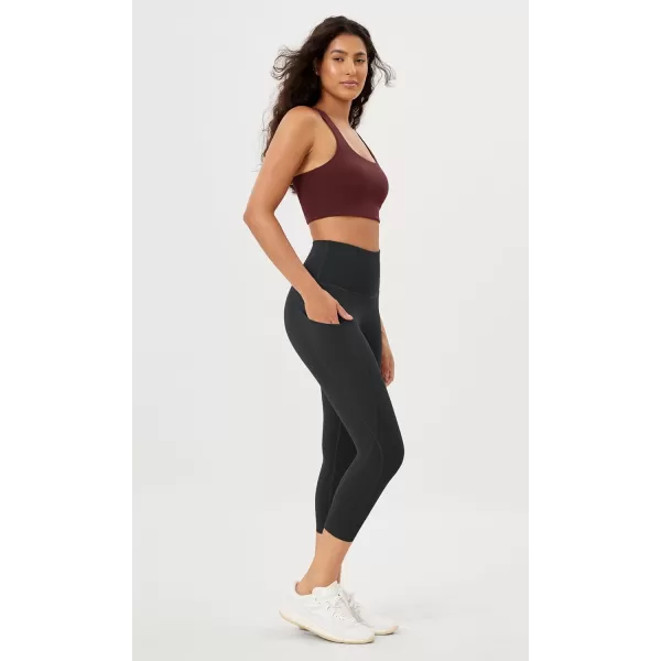 imageODODOS Womens High Waisted Yoga Leggings with Pockets Tummy Control Non See Through Workout Athletic Running Yoga PantsOnyx Black Grey