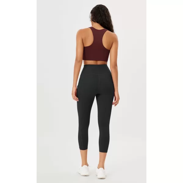 imageODODOS Womens High Waisted Yoga Leggings with Pockets Tummy Control Non See Through Workout Athletic Running Yoga PantsOnyx Black Grey