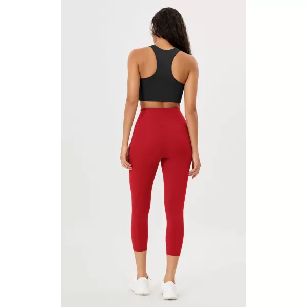 imageODODOS Womens High Waisted Yoga Leggings with Pockets Tummy Control Non See Through Workout Athletic Running Yoga PantsRed