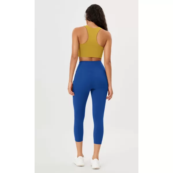 imageODODOS Womens High Waisted Yoga Leggings with Pockets Tummy Control Non See Through Workout Athletic Running Yoga PantsRoyal Blue