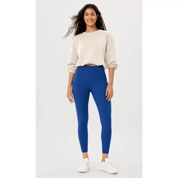imageODODOS Womens High Waisted Yoga Leggings with Pockets Tummy Control Non See Through Workout Athletic Running Yoga PantsRoyal Blue