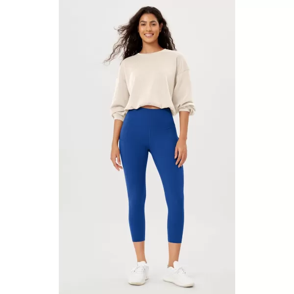 imageODODOS Womens High Waisted Yoga Leggings with Pockets Tummy Control Non See Through Workout Athletic Running Yoga PantsRoyal Blue