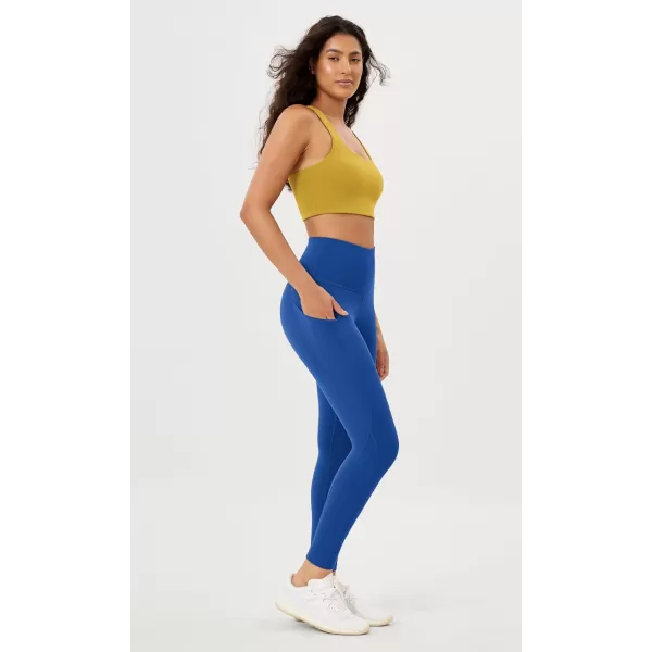 imageODODOS Womens High Waisted Yoga Leggings with Pockets Tummy Control Non See Through Workout Athletic Running Yoga PantsRoyal Blue