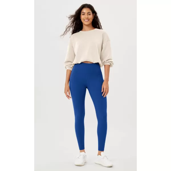 imageODODOS Womens High Waisted Yoga Leggings with Pockets Tummy Control Non See Through Workout Athletic Running Yoga PantsRoyal Blue